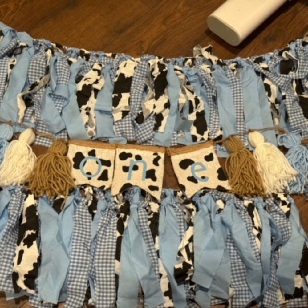 "One" highcahir banner and 2 fringe banners